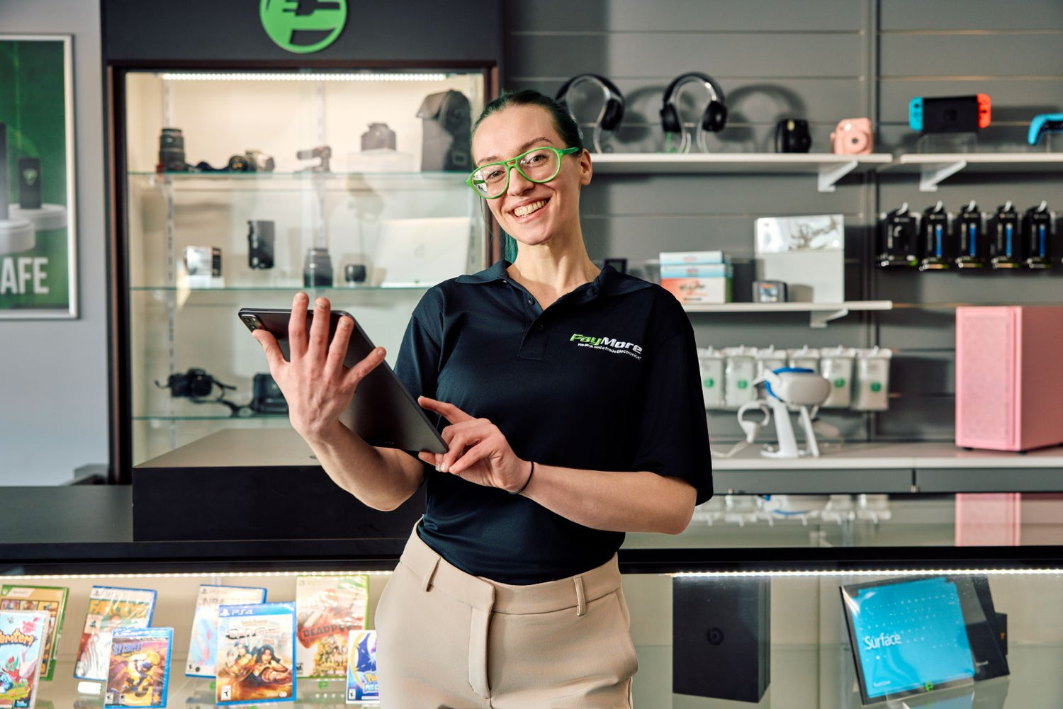 employee holding a tablet and smiling